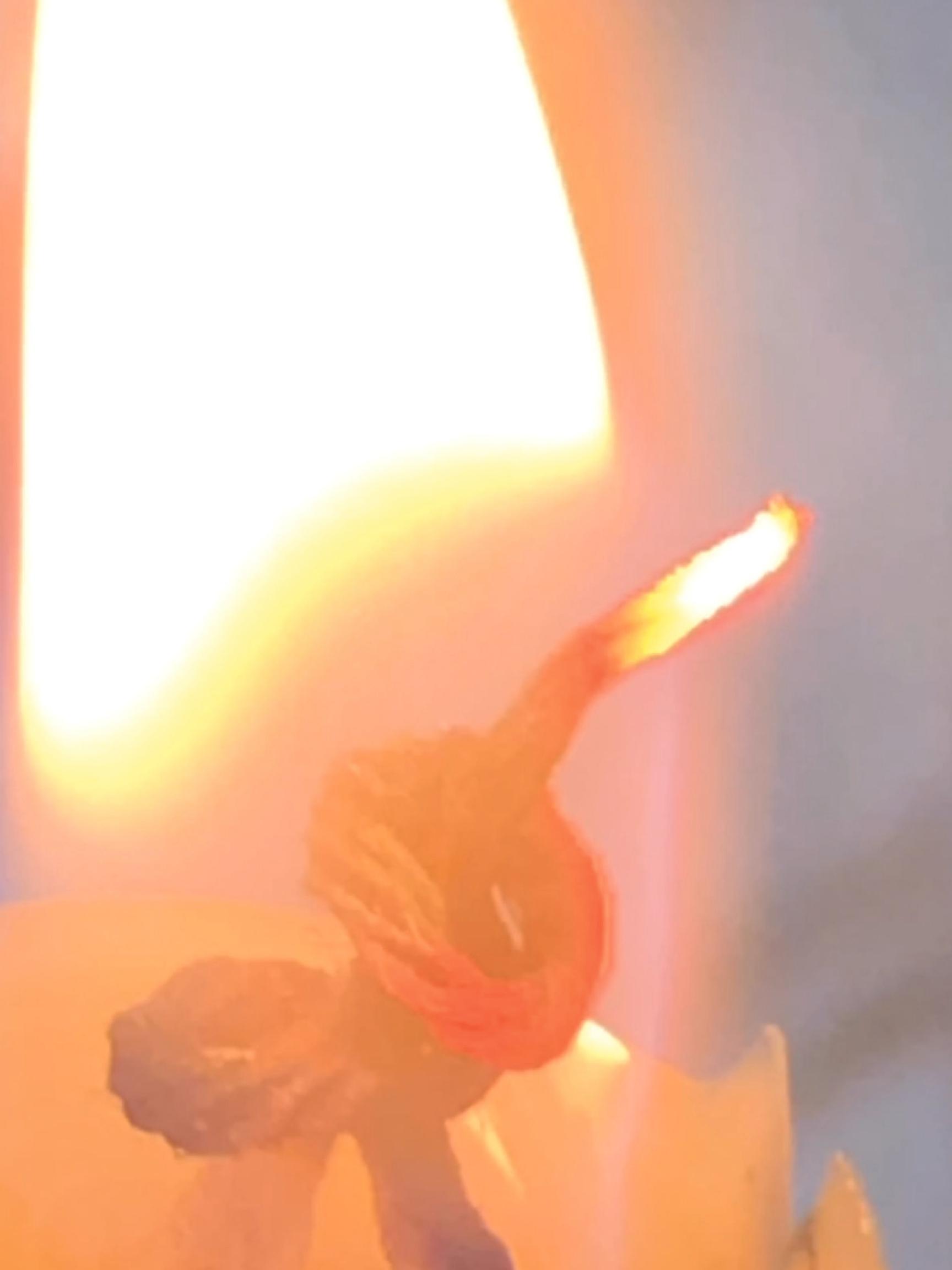 close up of candle wick burning